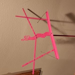 Pink metal music stand w/ Treble clef design
